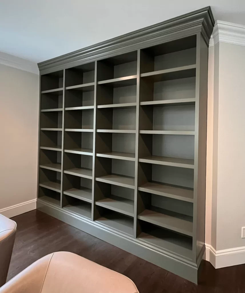 Stunning finished bookshelf completed by master carpenter Fabio and top sprayer, Manolo.